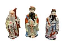THREE CHINESE PORCELAIN TRANSFER DECORATED SANXING SMALL STATUES