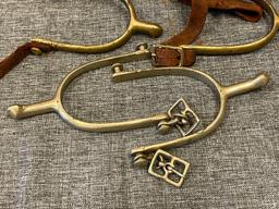 TWO PAIRS OF ANTIQUE WWI ERA US CAVALRY RIDING SPURS ONE PAIR IS MARKED "U.S. - A.B."