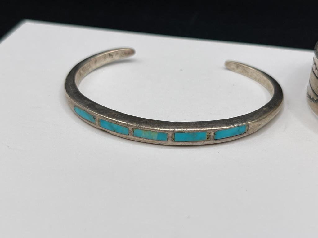 THREE NAVAJO STERLING SILVER TURQUOISE CUFF BRACELET INCLUDING ONE SIGNED BY LARRY BENNETT
