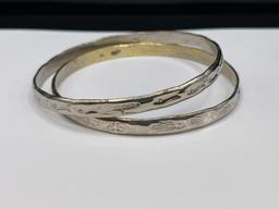 PAIR OF SILVERTONED SOUTHWESTERN BANDLE BRACELETS