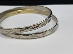 PAIR OF SILVERTONED SOUTHWESTERN BANDLE BRACELETS