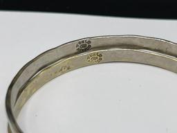 PAIR OF SILVERTONED SOUTHWESTERN BANDLE BRACELETS