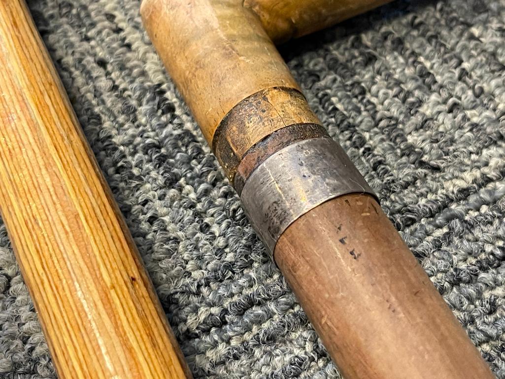 THREE WOOD WALKING STICKS INCLUDING ONE POLISHED PINE WITHG BRASS NOB HANDLE