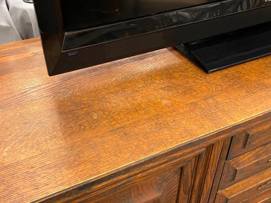 VINTAGE SOLID OAK CONSOLE TABLE FEATURING THREE DRAWERS AND TWO CABINETS