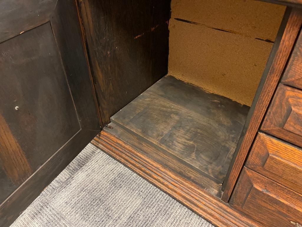 VINTAGE SOLID OAK CONSOLE TABLE FEATURING THREE DRAWERS AND TWO CABINETS