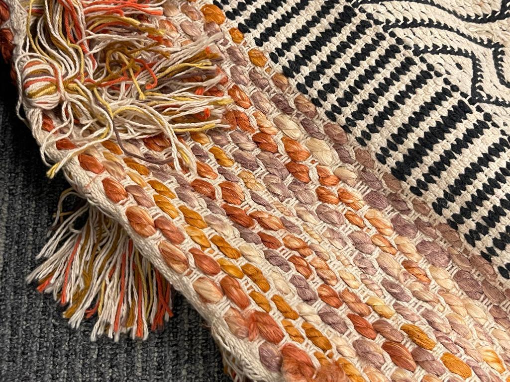 SOUTHWESTERN WOVEN TASSLED RUG