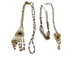 FOUR GOLD TONE STATEMENT NECKLACES INCLUDING THREE VINTAGE, ONE BEADED, AND ONE BY MAYA