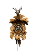 GERMAN BLACK FOREST HUNTER STYLE CUCKOO CLOCK WITH CARVINGS OF STAG, BIRD, AND RABBIT
