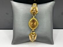 10K YELLOW GOLD WATCH BAND WITH NATURAL GOLD NUGGETS, FIGURAL RAM'S HEAD, AND DIAMONDS