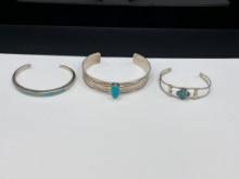 THREE NAVAJO STERLING SILVER TURQUOISE CUFF BRACELET INCLUDING ONE SIGNED BY LARRY BENNETT