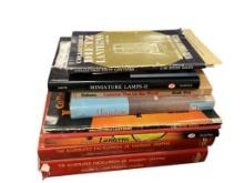 TEN ASSORTED VINTAGE BOOKS AND GUIDES ON COLLECTING LNTERNS, LAMPS, RAILROAD LIGHTING AND MORE