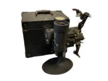 CIRCA 1920'S BELL & HOWELL "FILMO 57" 16MM MOTION-PICTURE PROJECTOR WITH ORIGINAL CASE