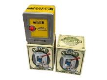 TWO NEW IN BOX WESTERUNION MOTIF SCHYLLING STEEL TOY SAFES WITH ALARMS