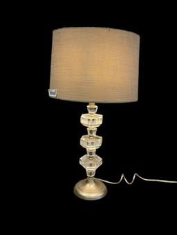 MODERN CONTEMPORARY STACKED LUCITE TABLE LAMP WITH SILVER FINISH ROUND BASE AND TEXTILE SHADE