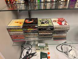 MORE THAN 60 ASSORTED MUSICAL CD'S INCLUDING CHICAGO, LINKIN PARK, BENNY GOODMAN, AND MORE