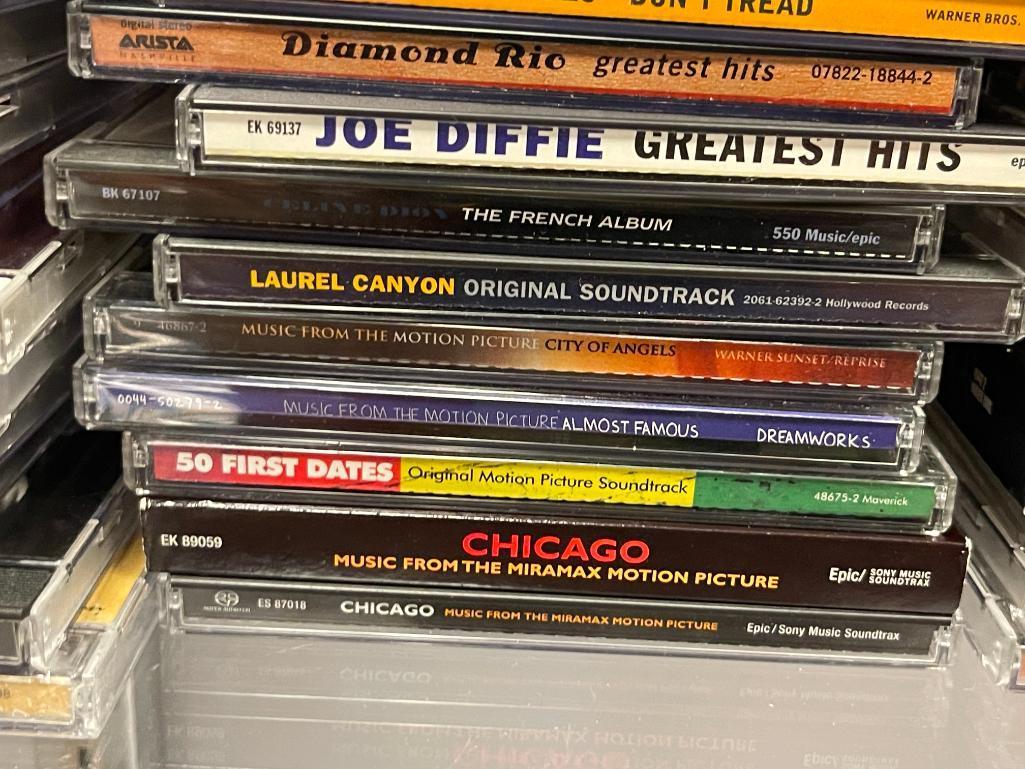 MORE THAN 60 ASSORTED MUSICAL CD'S INCLUDING CHICAGO, LINKIN PARK, BENNY GOODMAN, AND MORE