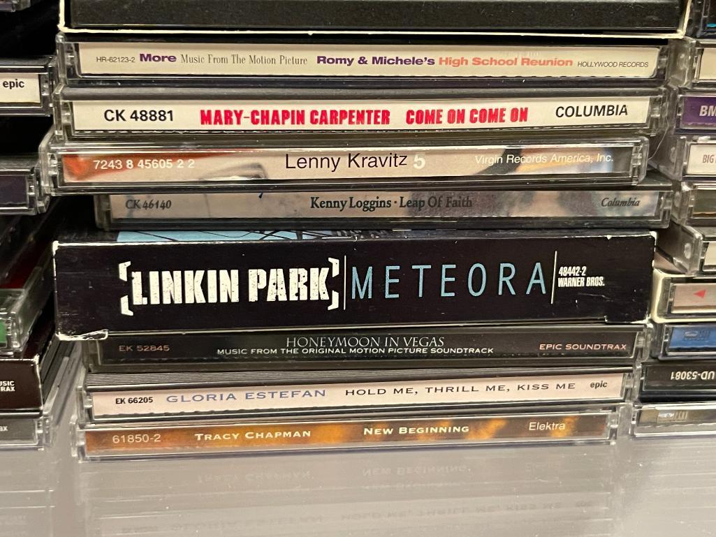 MORE THAN 60 ASSORTED MUSICAL CD'S INCLUDING CHICAGO, LINKIN PARK, BENNY GOODMAN, AND MORE