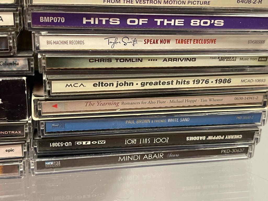 MORE THAN 60 ASSORTED MUSICAL CD'S INCLUDING CHICAGO, LINKIN PARK, BENNY GOODMAN, AND MORE
