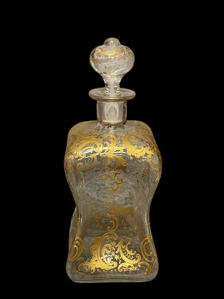 LATE 1800'S EUROPEAN HAND BLOWN PINCHED GLASS DECANTER WITH GILT ENCRUSTED LEAF DESIGN, WITH STOP...