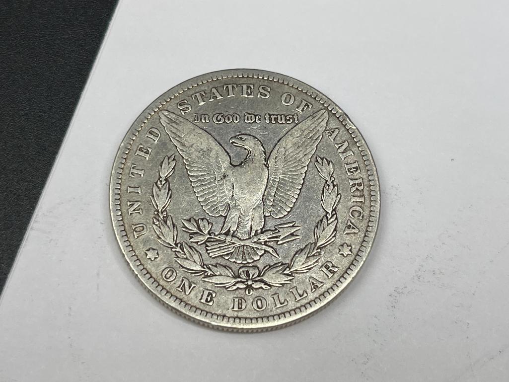 FIVE ASSORTED U.S. MORGAN SILVER DOLLARS