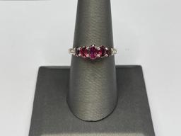STERLING SILVER RHODOLITE GARNET RING FEATURING FIVE GRADUATED GARNETS