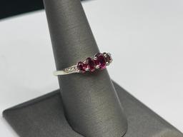 STERLING SILVER RHODOLITE GARNET RING FEATURING FIVE GRADUATED GARNETS