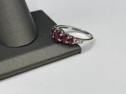 STERLING SILVER RHODOLITE GARNET RING FEATURING FIVE GRADUATED GARNETS