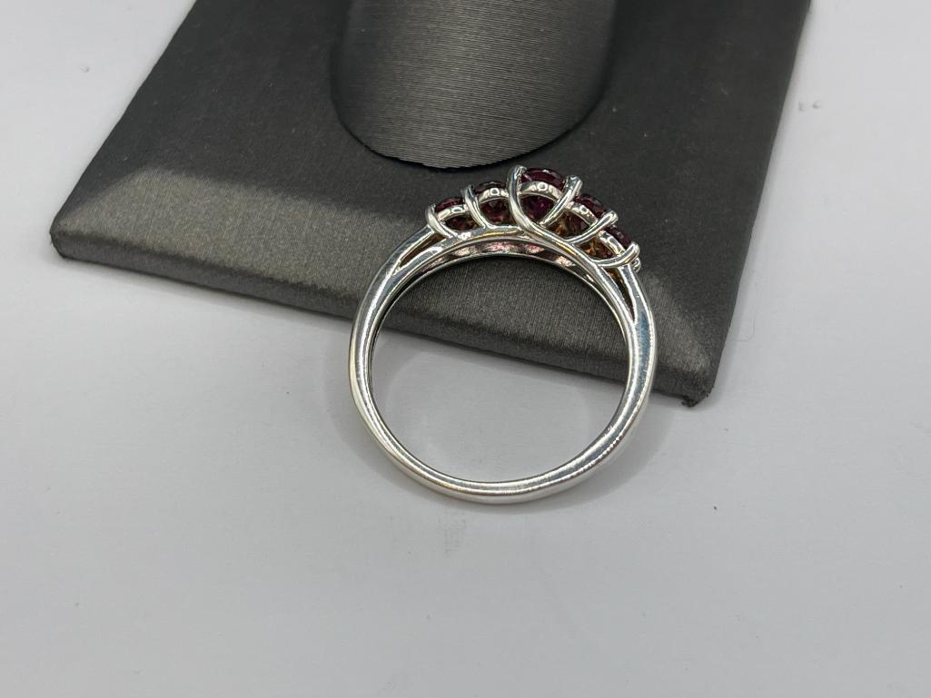 STERLING SILVER RHODOLITE GARNET RING FEATURING FIVE GRADUATED GARNETS