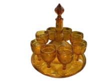 VINTAGE INDIANA TIARA GLASS AMBER DECANTER SET FEATURING DECANTER, EIGHT CUPS, AND SERVING TRAY