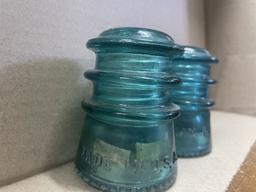 2  "Hemingray" Glass Insulators