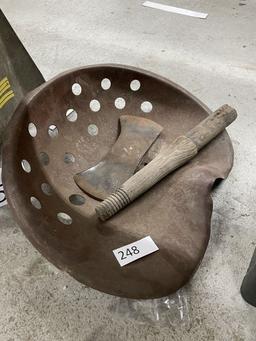 Metal tractor seat and axe head