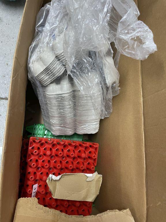 Box full of egg cartons