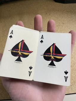 2 decks of Thompson Products Inc Collectable playing cards