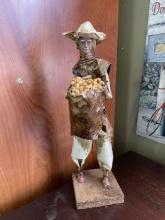 Handcrafted Folk Art Figure  Worker with Sack of Beans