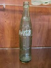 Vintage Coca-Cola 16 oz. Green Glass Bottle (c. 1960sâ€“1970s)