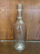 Citrate Magnesia Embossed Glass Bottle (Early-Mid 20th Century)