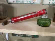 D-X Red Hand Oil Can and Green Swirl Glass Jar
