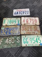 Lot of 7 vintage license plates wall art