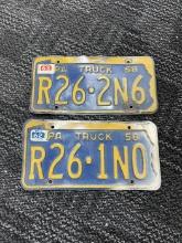 Lot of 2 vintage license plates wall art