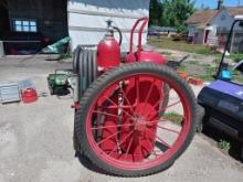 Cart with tanks and hoses