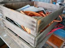 Wooden crate various signs and ext cord