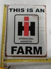 International Harvester metal sign