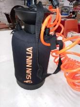Black and Orange Portable shower (beach, camping)