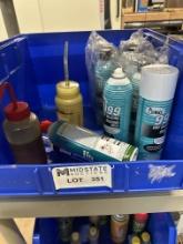 Blue Stackable Plastic Bin With Multiple Camie 999 Dry Silicone Spray Cans
