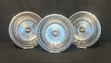 Three 1970's 14" Mercury Cougar Marquis Hubcaps