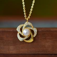 An Exquisite Sterling Silver-Gold Plated Inlaid White Jade Pendant