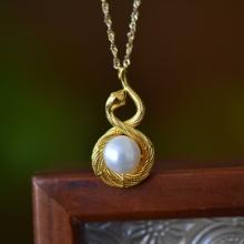 An Exquisite Sterling Silver-Gold Plated Inlaid White Jade Pendant