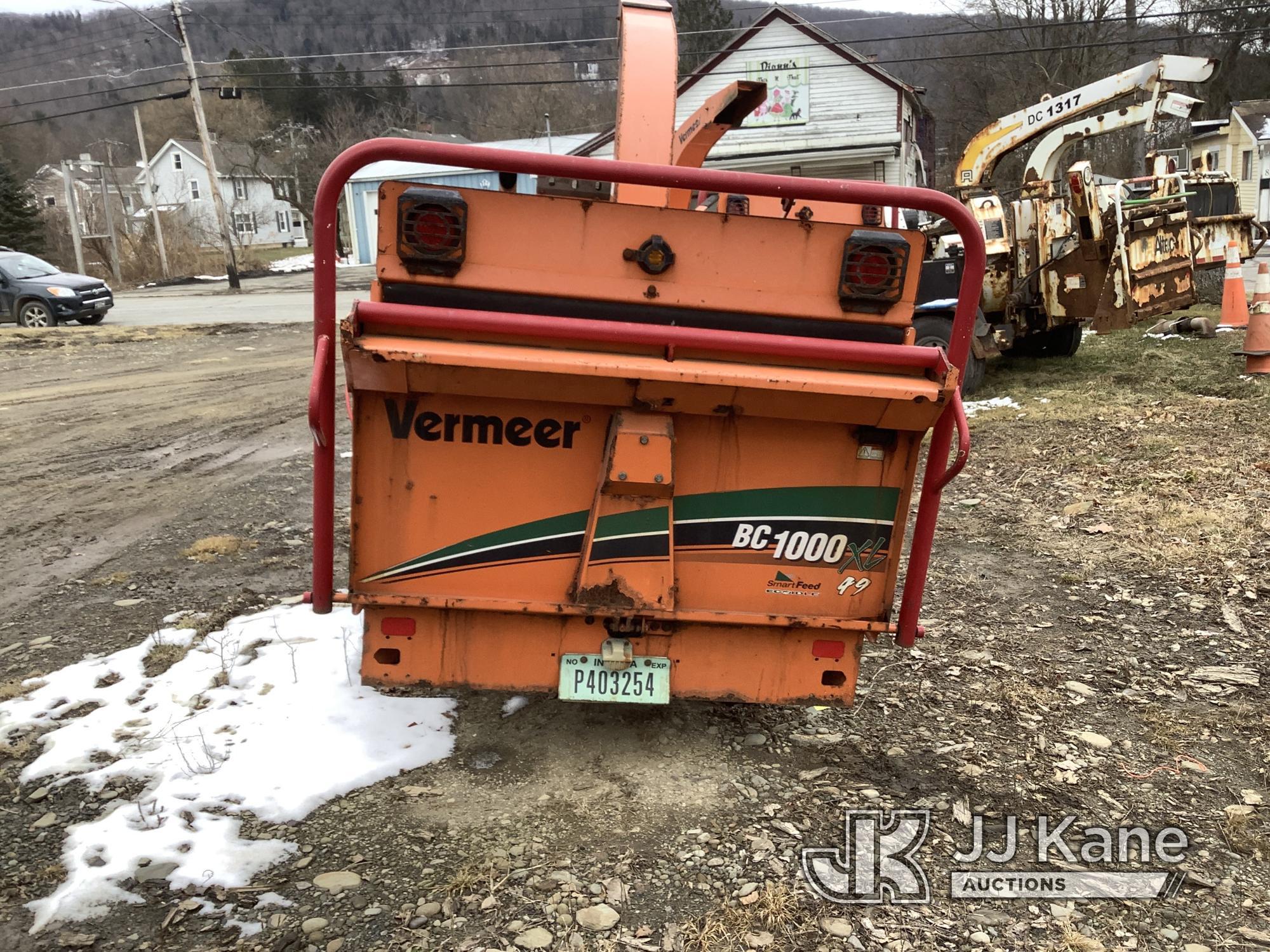 (Deposit, NY) 2014 Vermeer BC1000XL Chipper (12in Drum), trailer mtd Runs, Bad Tire Off Rim on Right