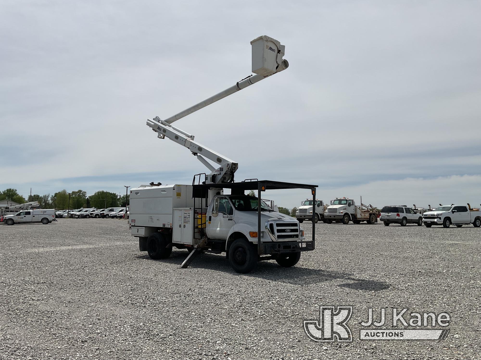 (Hawk Point, MO) Altec LR756, Over-Center Bucket Truck mounted behind cab on 2013 Ford F750 Chipper