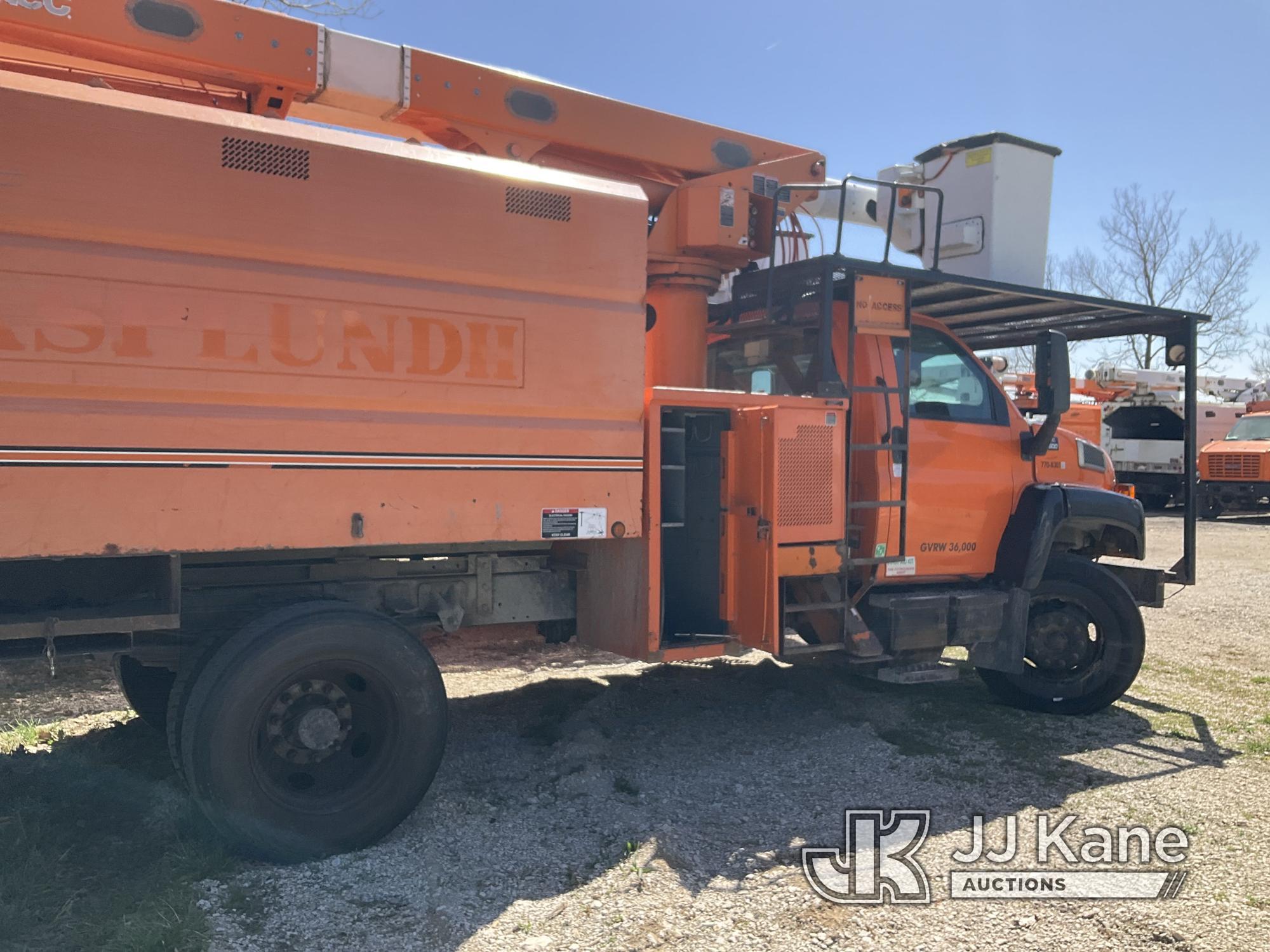 (Kansas City, MO) Altec LRV55, Over-Center Bucket Truck mounted behind cab on 2006 GMC C7500 Chipper